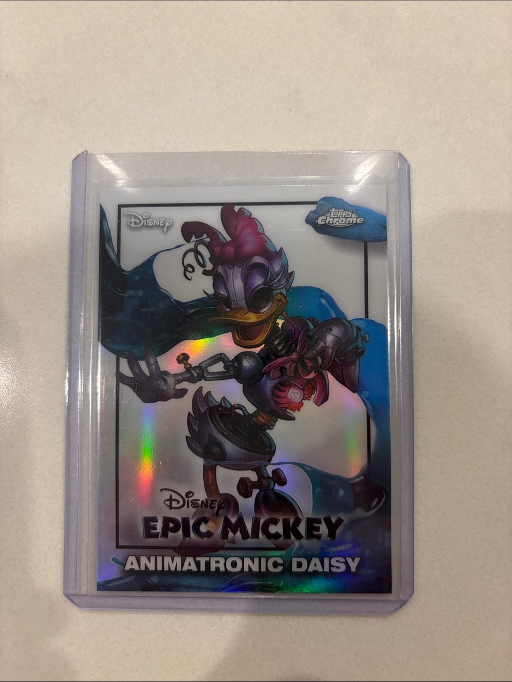Disney Epic Mickey Animatronic Daisy Holographic Card - Purple, Blue, Black